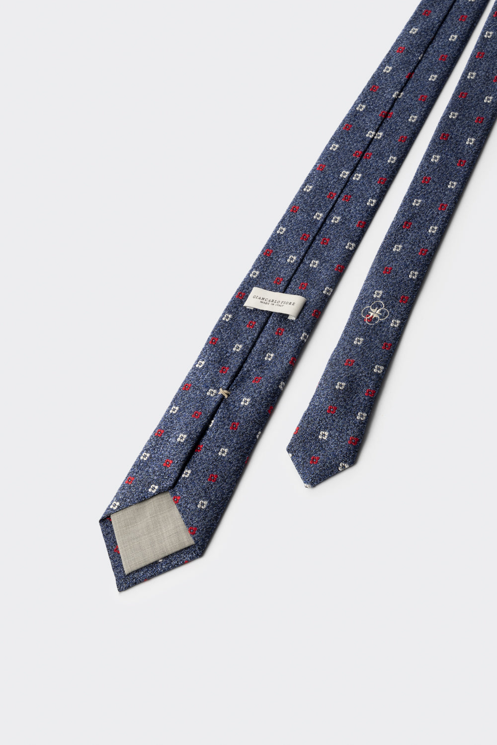 Cravatta in seta e cotone con microfantasia floreale blu