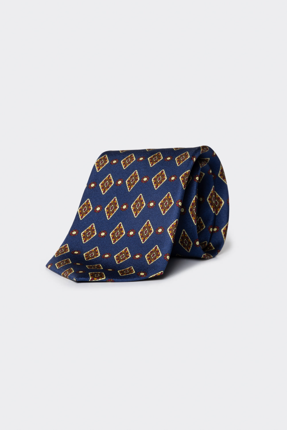 Cravatta con fantasia geometrica a rombi blu