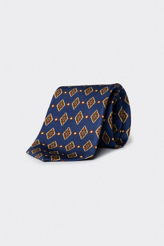 Cravatta con fantasia geometrica a rombi blu