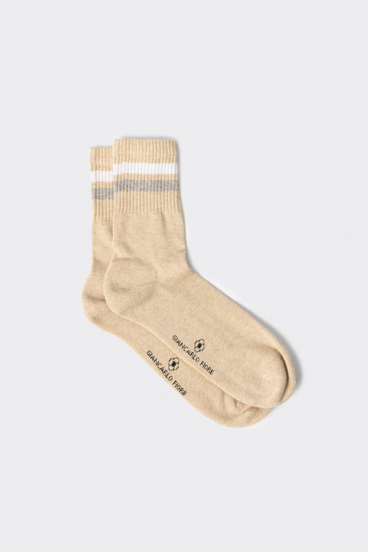 Calza lunga a coste con profili a contrasto Beige